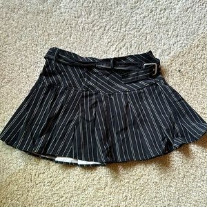 Black and white pleaded skirt for women on sale now!